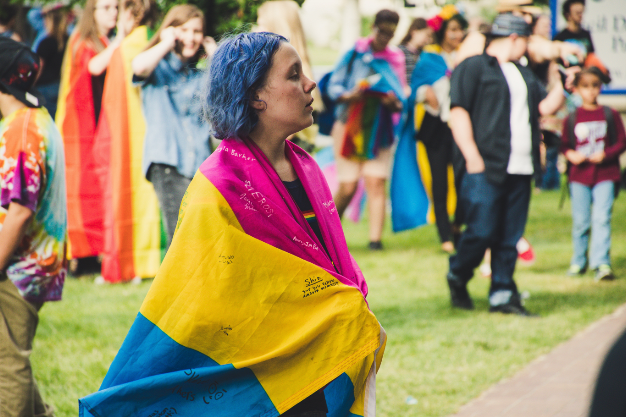 Girl Covered in Pride Flag